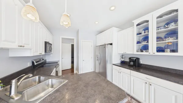 a view of a dining room with furniture