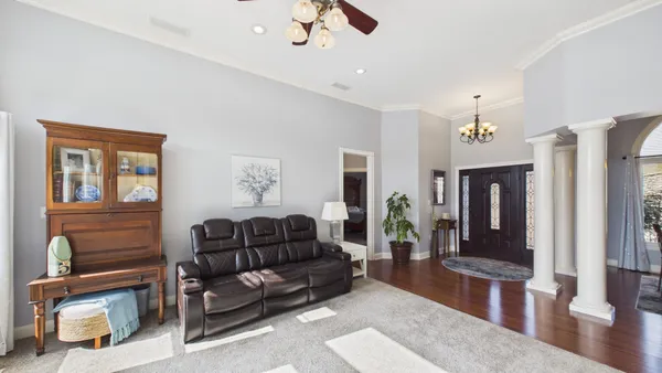 a view of a livingroom with furniture window and outside view