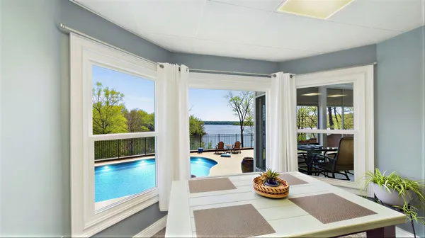 a view of a building with a garden and plants