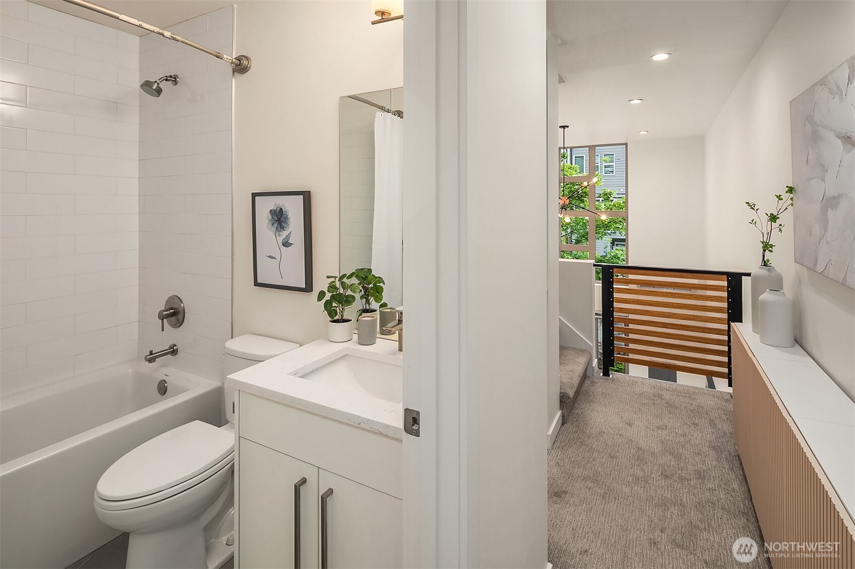 4308 26th Avenue Southwest, Unit F Seattle, WA 98106 - Photo 11 of 21 a bathroom with a sink a toilet and shower