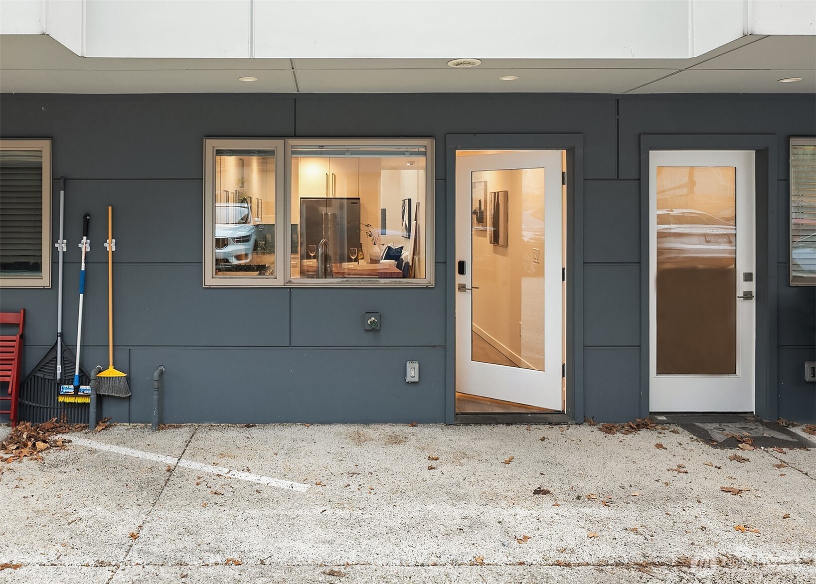 4308 26th Avenue Southwest, Unit F Seattle, WA 98106 - Photo 20 of 21 a view of a livingroom with wooden floor and a window