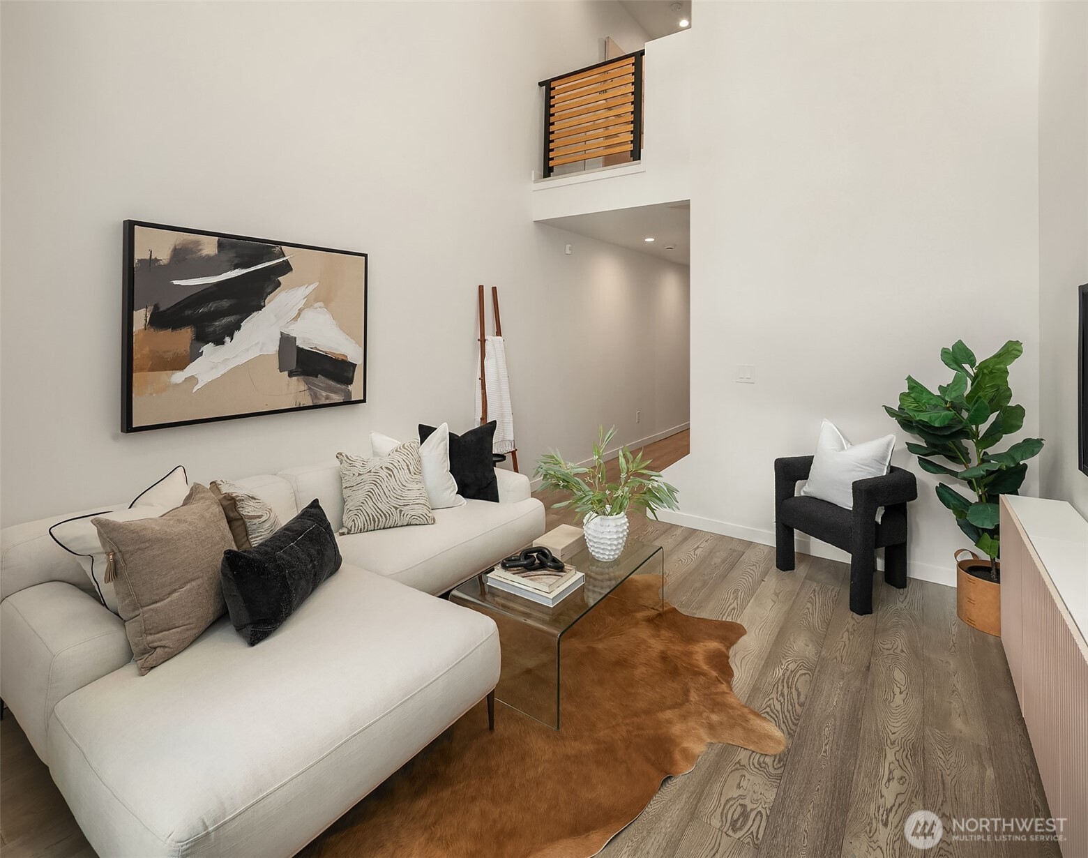 4308 26th Avenue Southwest, Unit F Seattle, WA 98106 - Photo 5 of 21 a living room with furniture and wooden floor