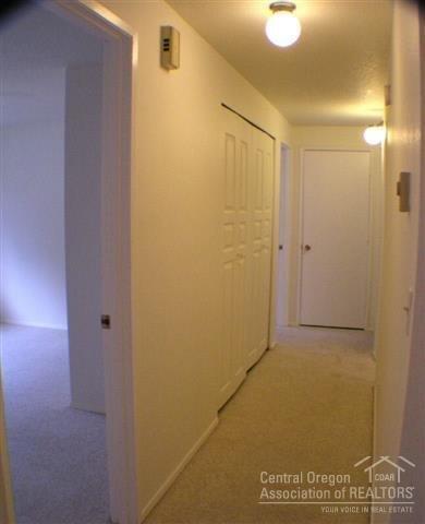 59720 Navajo Road Bend, OR 97702 - Photo 11 of 23 Hallway with Laundry
