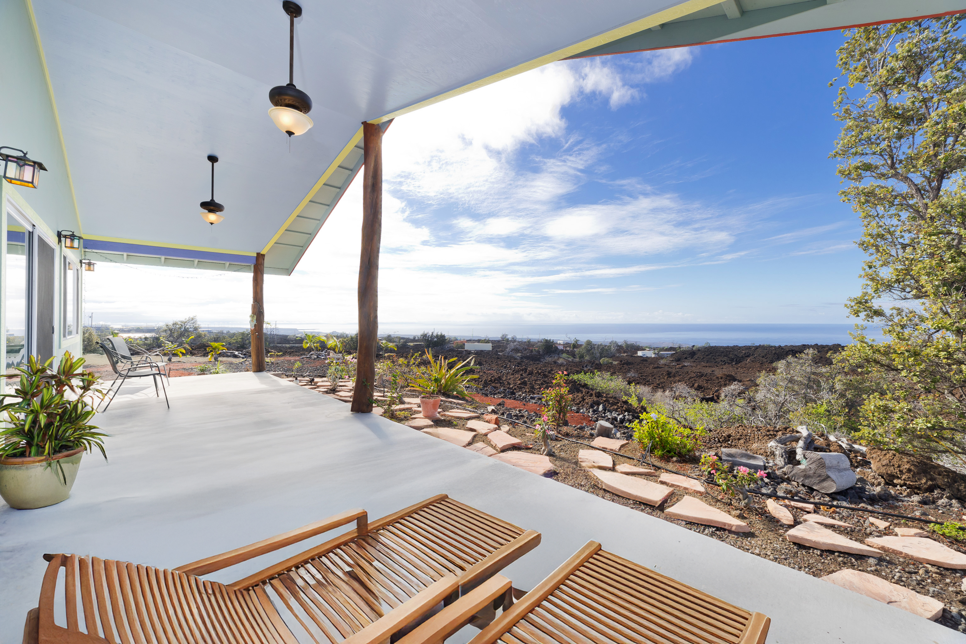 92-8427 Hibiscus Drive Ocean View, HI 96704 - Photo 14 of 30 a outdoor view with a sitting space