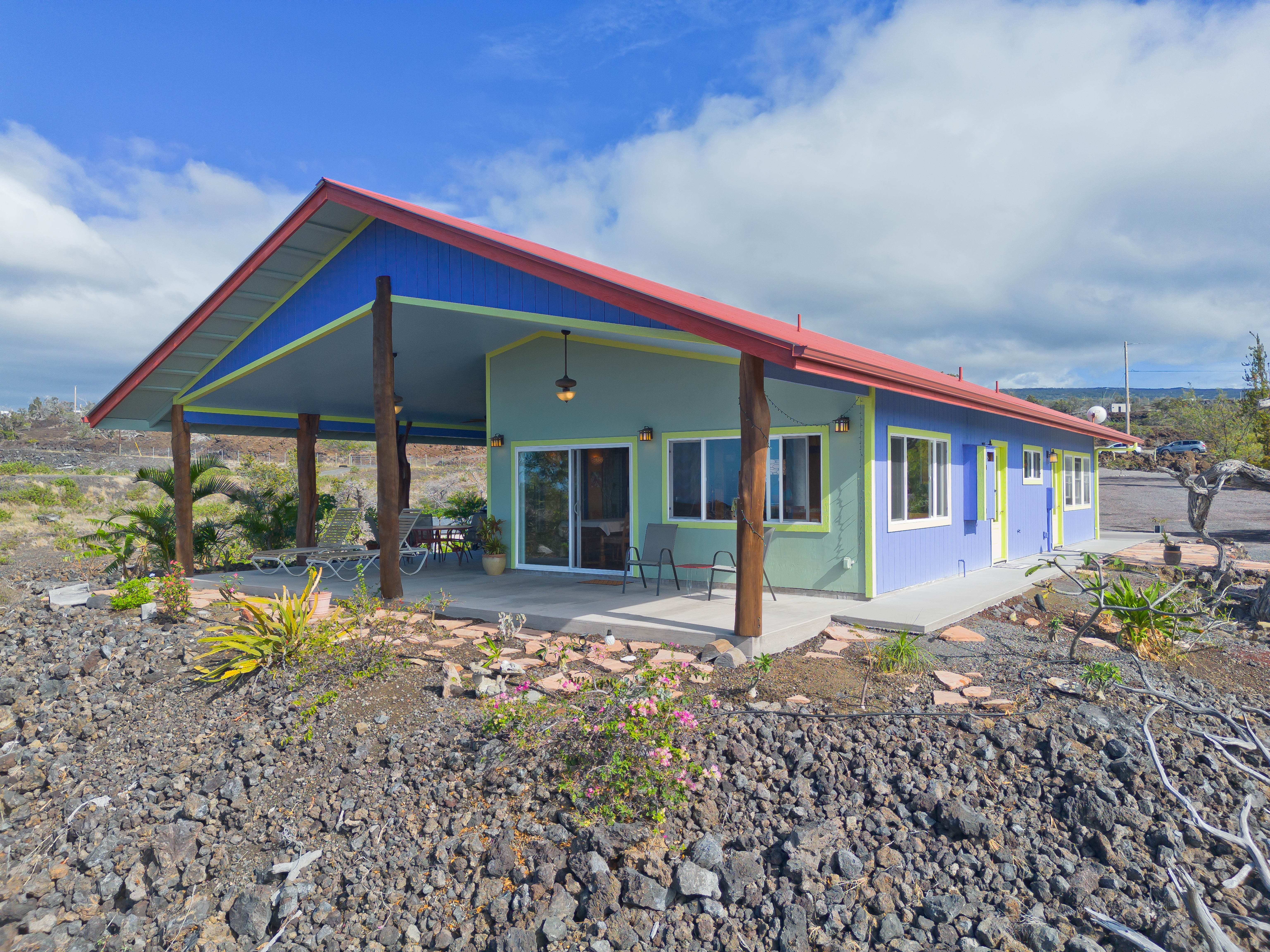 92-8427 Hibiscus Drive Ocean View, HI 96704 - Photo 4 of 30 a view of house with outdoor space