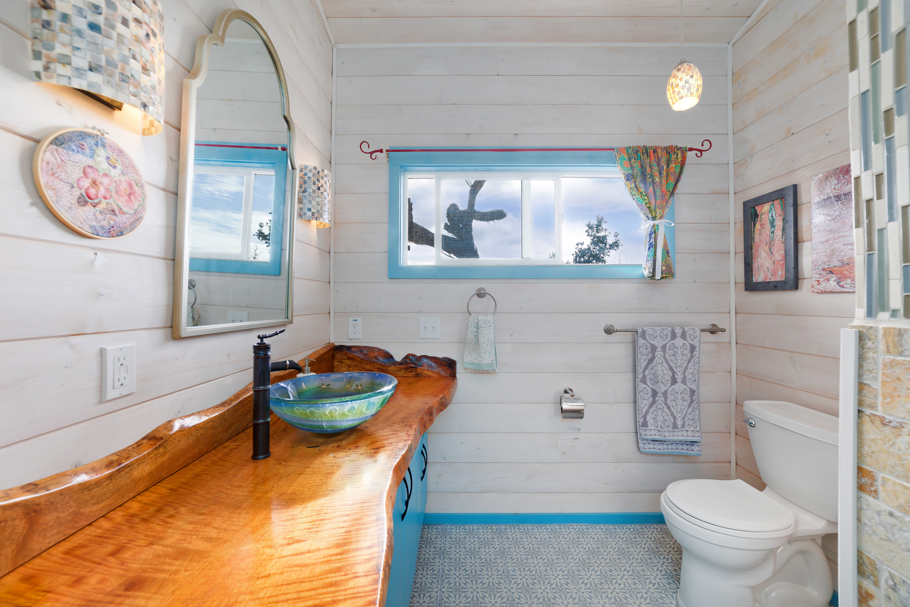 92-8427 Hibiscus Drive Ocean View, HI 96704 - Photo 7 of 30 a bathroom with a toilet a sink and bathtub