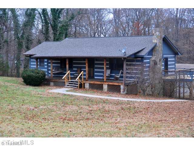 6711 Bastille Lane Oak Ridge, NC 27310 - Photo 1 of 16 Exterior Front. Great Rocking Chair Front Porch