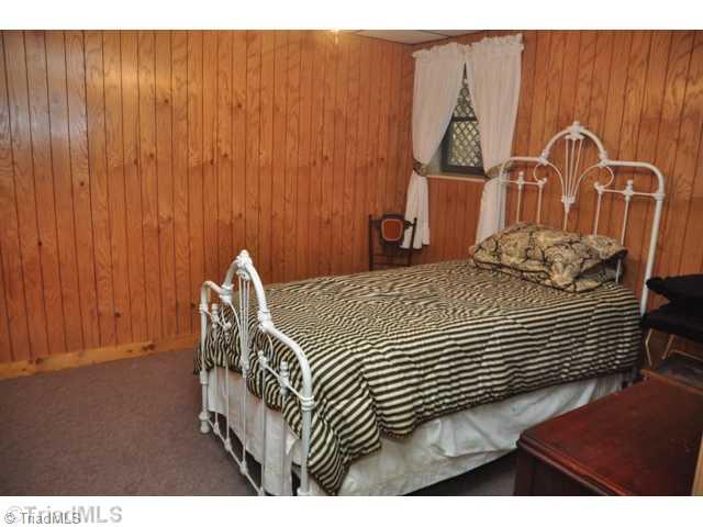 6711 Bastille Lane Oak Ridge, NC 27310 - Photo 12 of 16 4th Bedroom. Need to get away alone? Try the lower level 4th bedroom