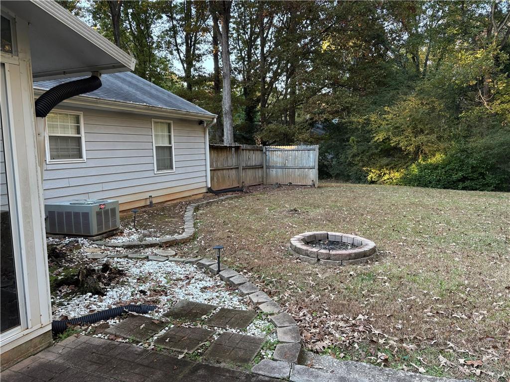 211 Brooks Lane Winder, GA 30680 - Photo 18 of 27 a backyard of a house with lots of green space