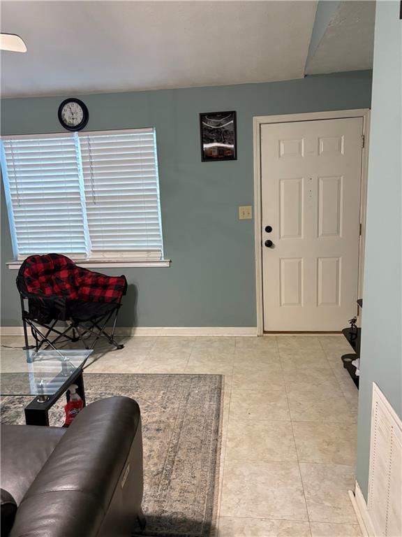 211 Brooks Lane Winder, GA 30680 - Photo 22 of 27 a view of livingroom with furniture and floor to ceiling window