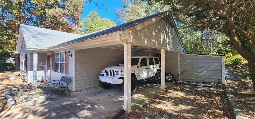 211 Brooks Lane Winder, GA 30680 - Photo 6 of 27 a view of a house with a yard