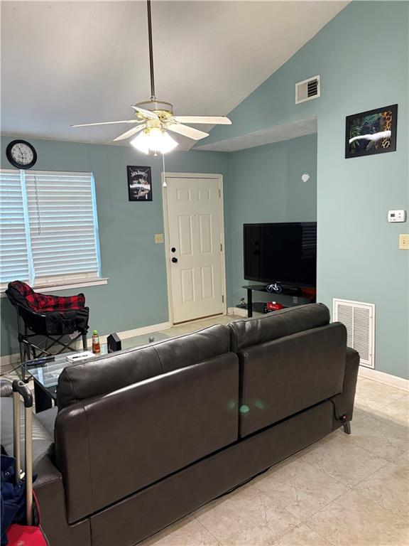 211 Brooks Lane Winder, GA 30680 - Photo 8 of 27 a living room with furniture and a flat screen tv