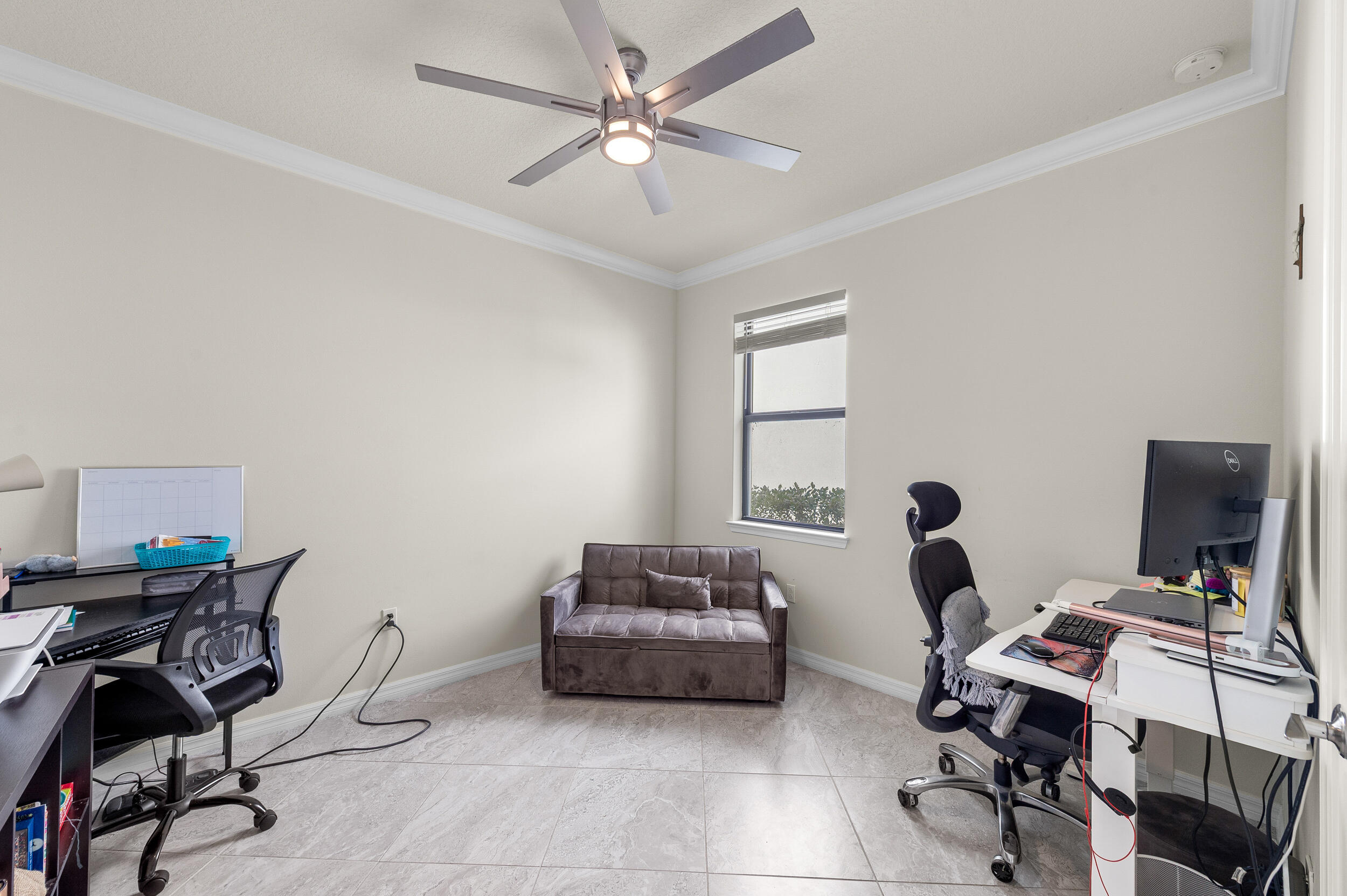 4762 Roldan Court Lake Worth, FL 33467 - Photo 12 of 33 a work room with furniture and a window