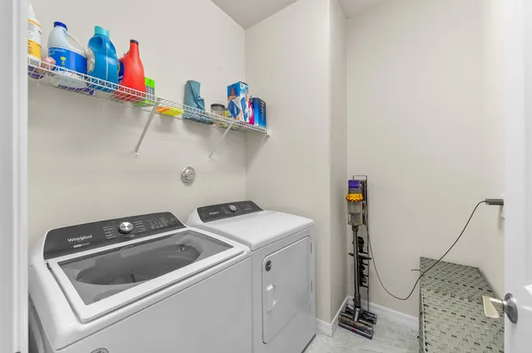 a utility room with dryer and washer
