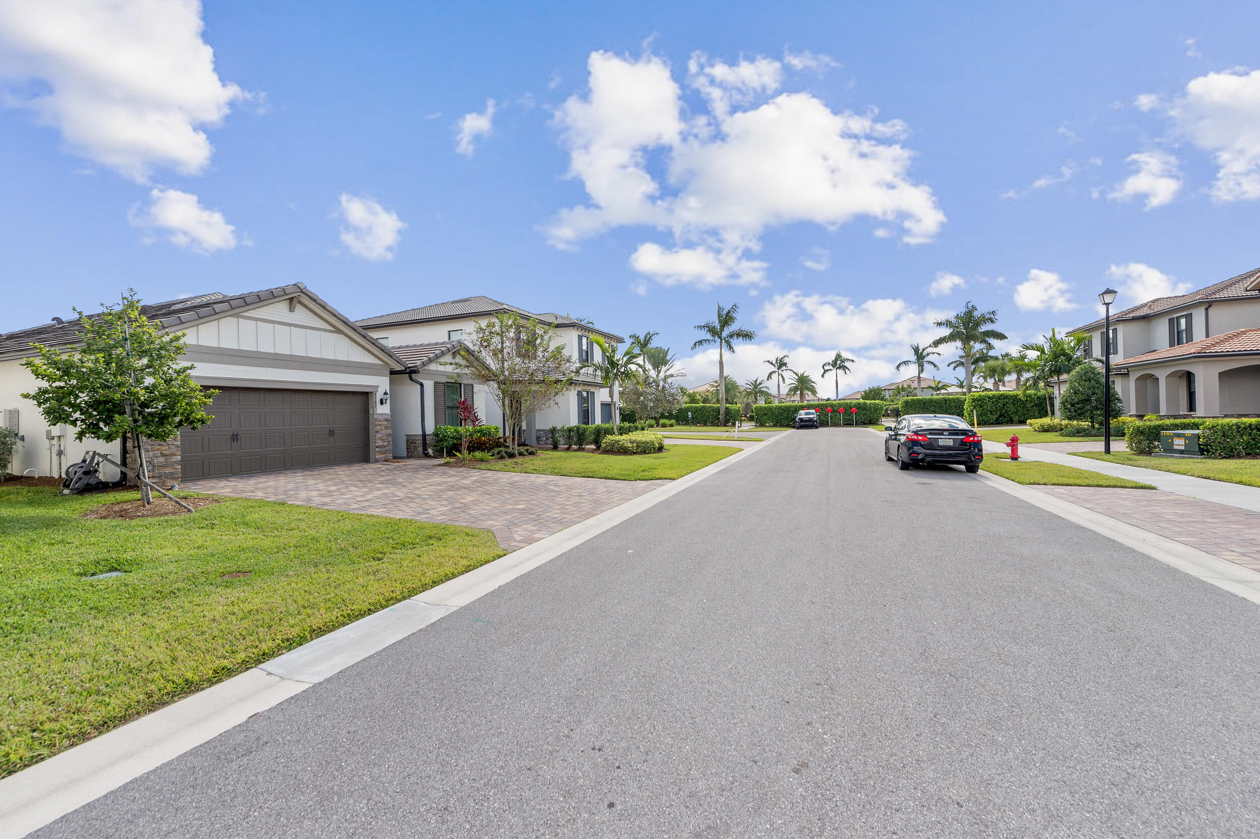 4762 Roldan Court Lake Worth, FL 33467 - Photo 4 of 33 a view of street with parked cars
