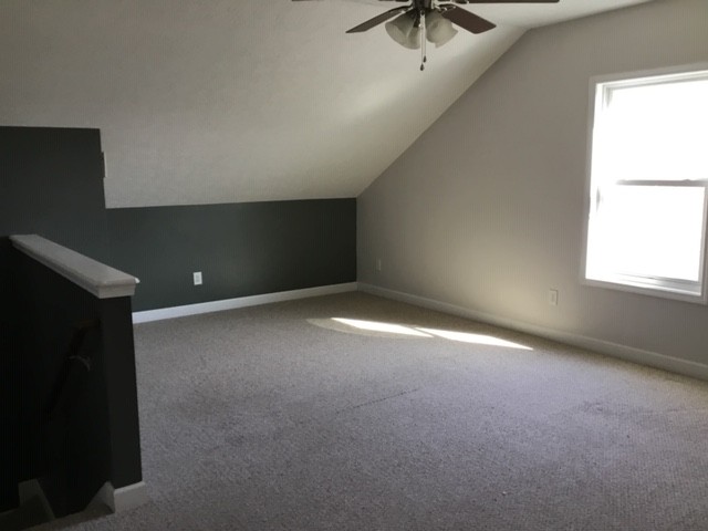 5975 Campbell Road Cross Plains, TN 37049 - Photo 14 of 26 en empty room with windows and ceiling fan