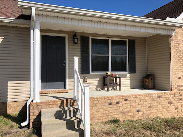 5975 Campbell Road Cross Plains, TN 37049 - Photo 3 of 26 a view of the house with outdoor seating