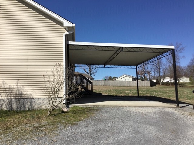 5975 Campbell Road Cross Plains, TN 37049 - Photo 22 of 26 a view of a house with a yard