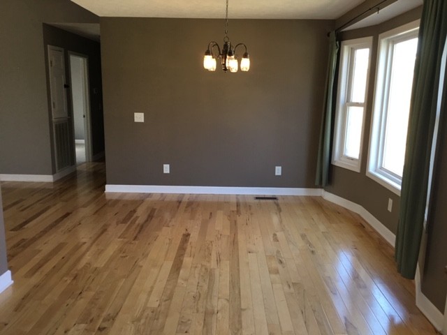 5975 Campbell Road Cross Plains, TN 37049 - Photo 8 of 26 a view of empty room with wooden floor and fan