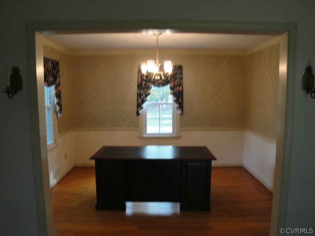 2655 Salisbury Road Midlothian, VA 23113 - Photo 4 of 7 a room with dining table and a chandelier