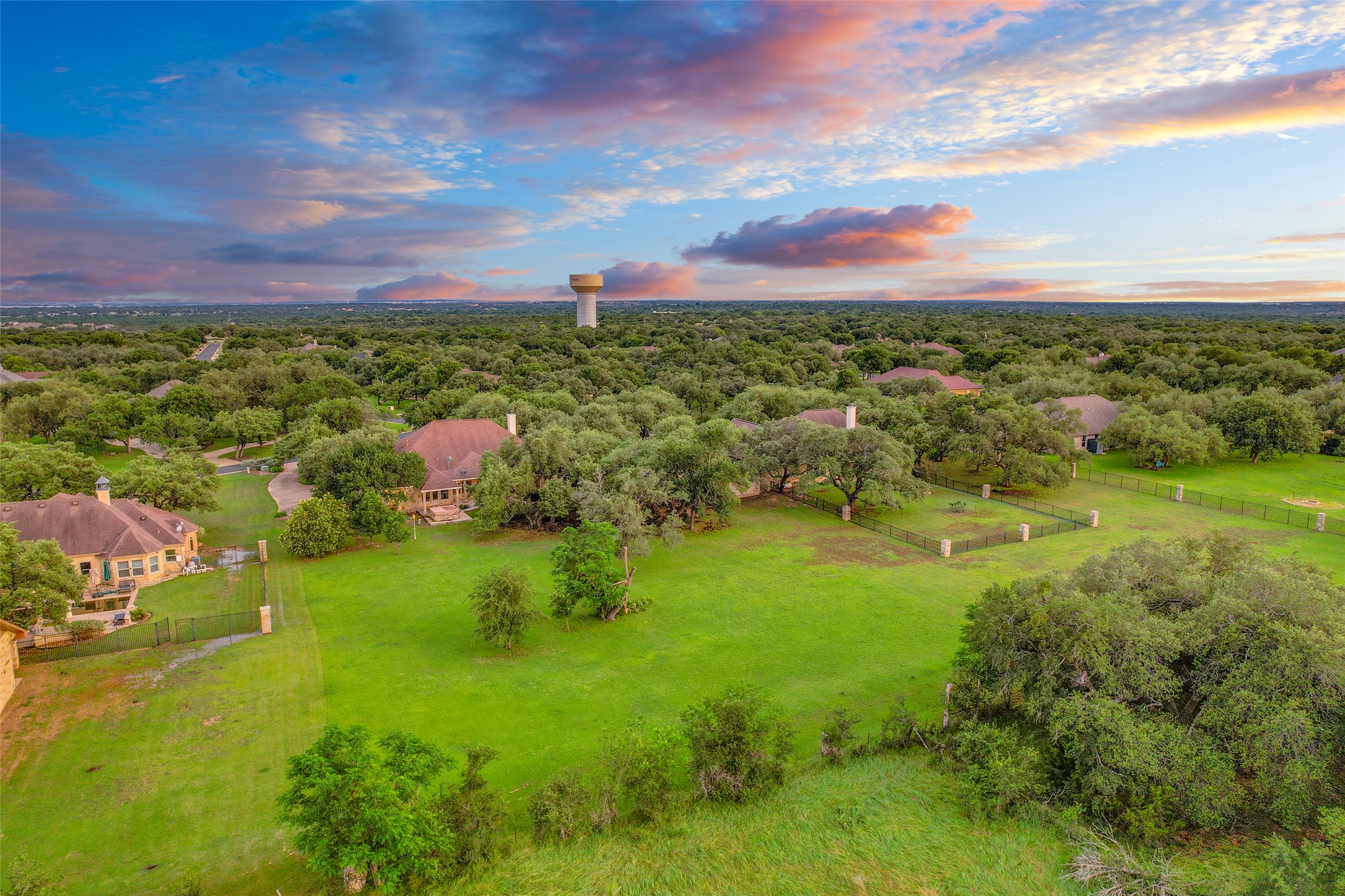 101 Copper Leaf Court Georgetown, TX 78633 - Photo 29 of 31 Expansive property featuring a verdant landscape with mature trees and manicured lawns