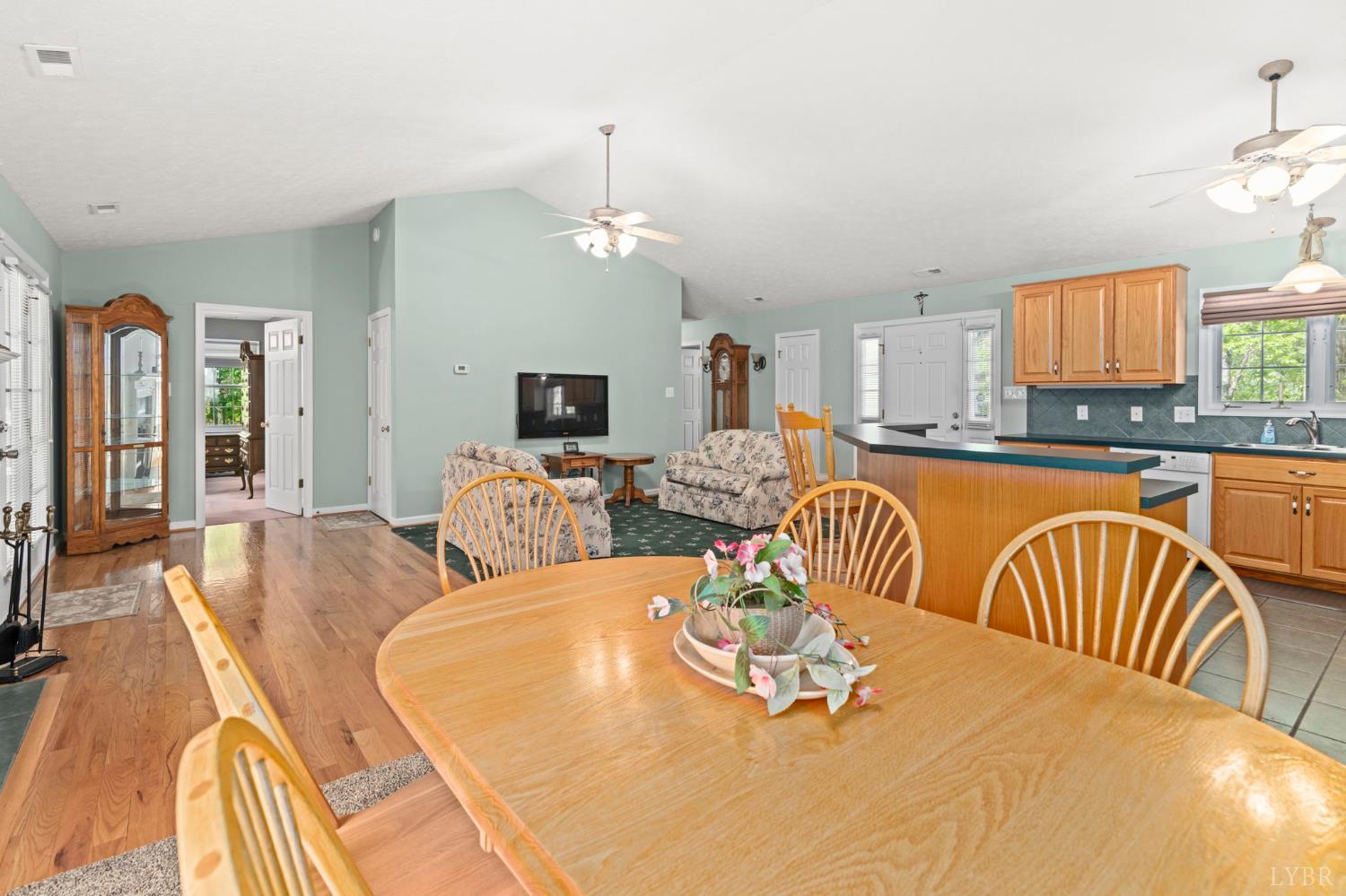 298 Braxton Ridge Road Amherst, VA 24521 - Photo 11 of 65 a view of a dining room with furniture