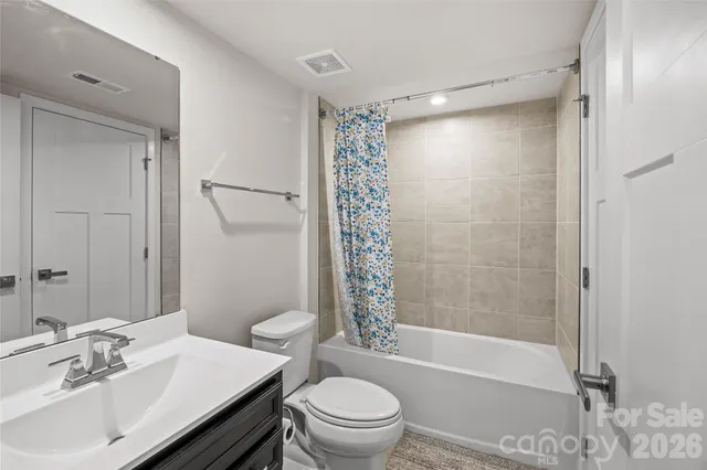 a view of a balcony with wooden floor