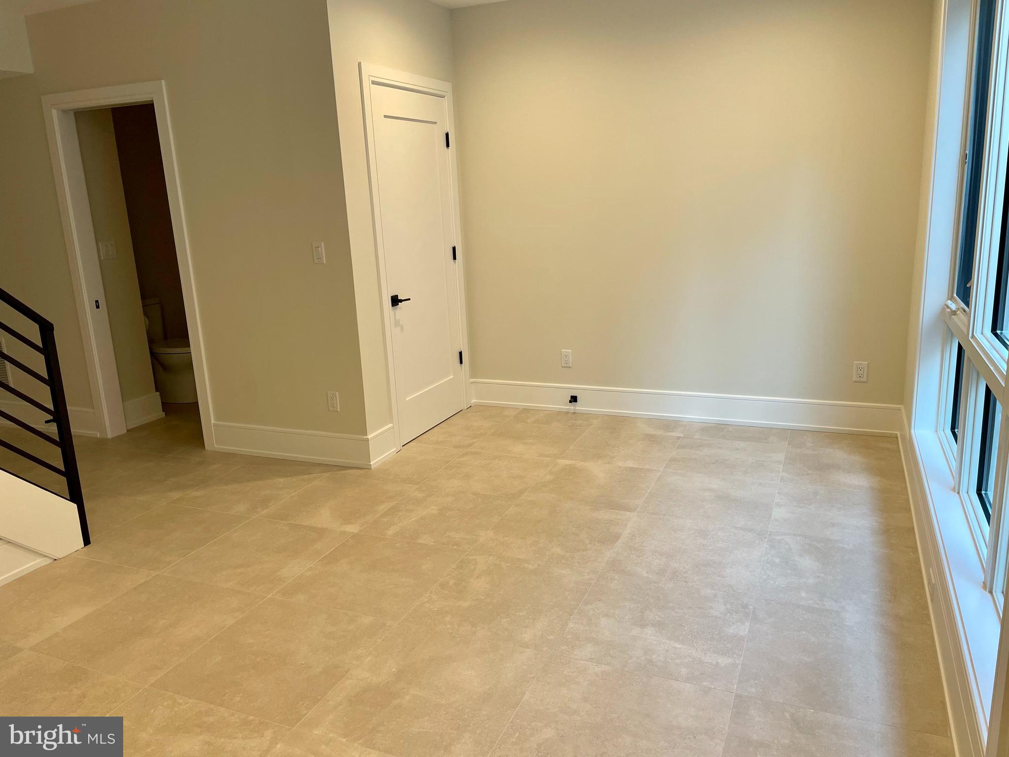 2011 Renaissance Walk, Unit 13 Philadelphia, PA 19145 - Photo 16 of 52 First level with powder rm & entrance to garage