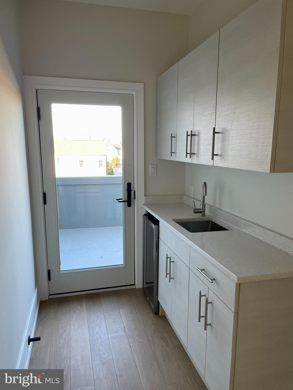 2011 Renaissance Walk, Unit 13 Philadelphia, PA 19145 - Photo 32 of 52 Optional custom bar, sink, refrig and extra storag