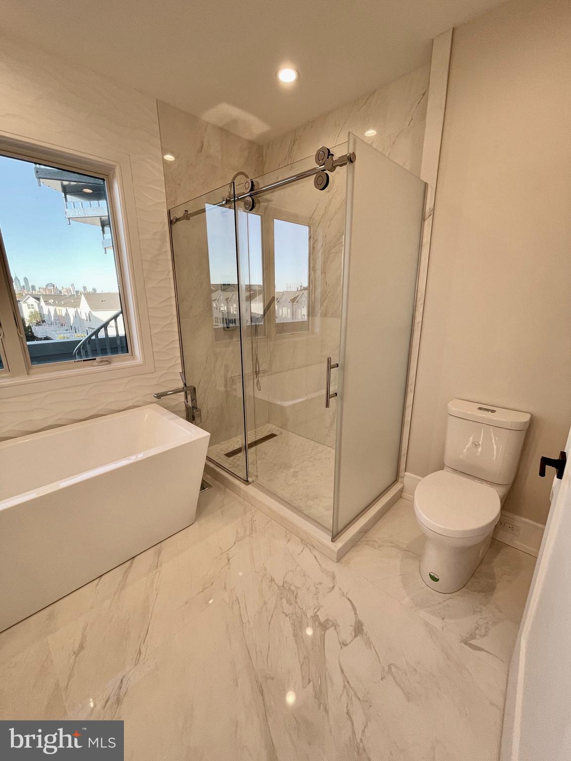 2011 Renaissance Walk, Unit 13 Philadelphia, PA 19145 - Photo 4 of 52 4th fl - Primary Bathroom, gorgeous tilework