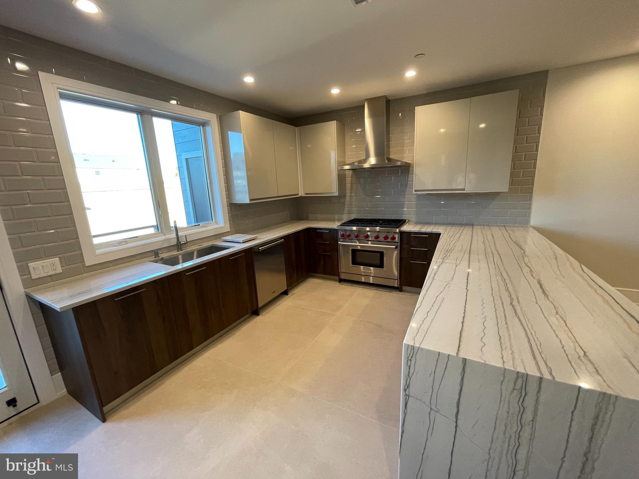 2011 Renaissance Walk, Unit 13 Philadelphia, PA 19145 - Photo 8 of 52 Porcelanosa designer kitchen