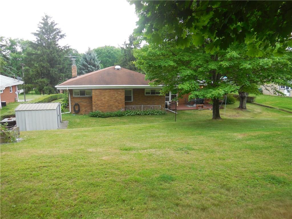 6 Poplar Street Beaver, PA 15009 - Photo 14 of 16 Beautiful backyard with shed and plenty of place to roam.