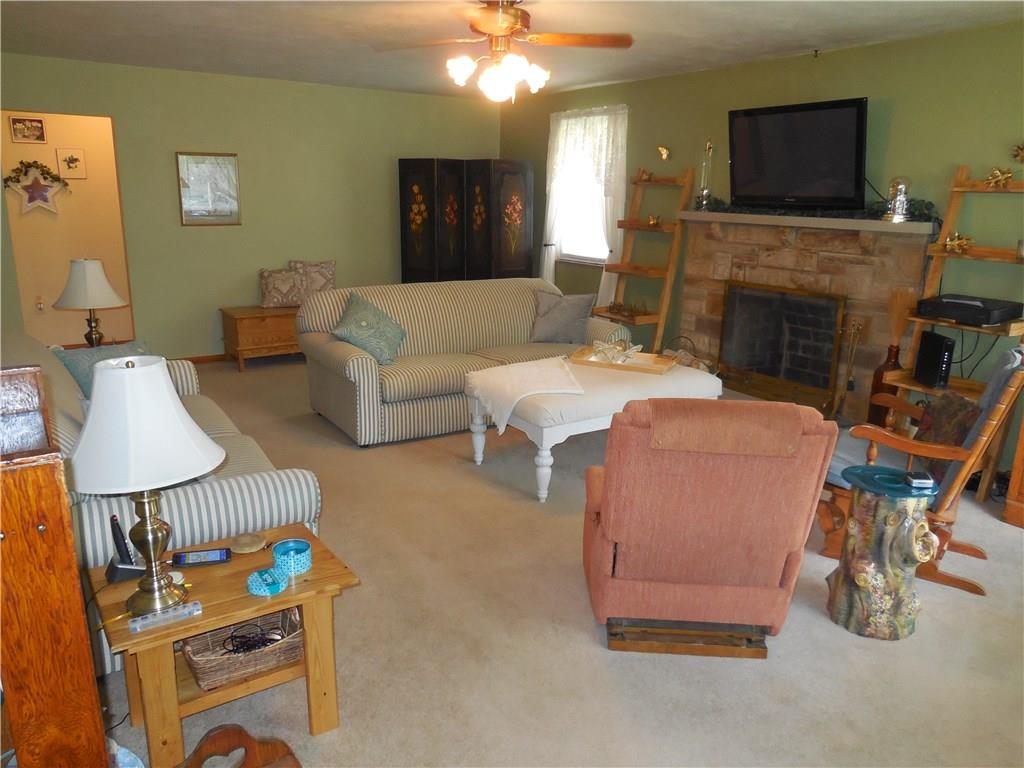 6 Poplar Street Beaver, PA 15009 - Photo 6 of 16 Oversized living room with gas fireplace.