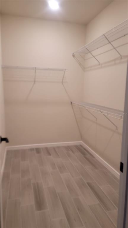 6558 Rover Way St. Cloud, FL 34771 - Photo 14 of 24 a view of an empty walk in closet