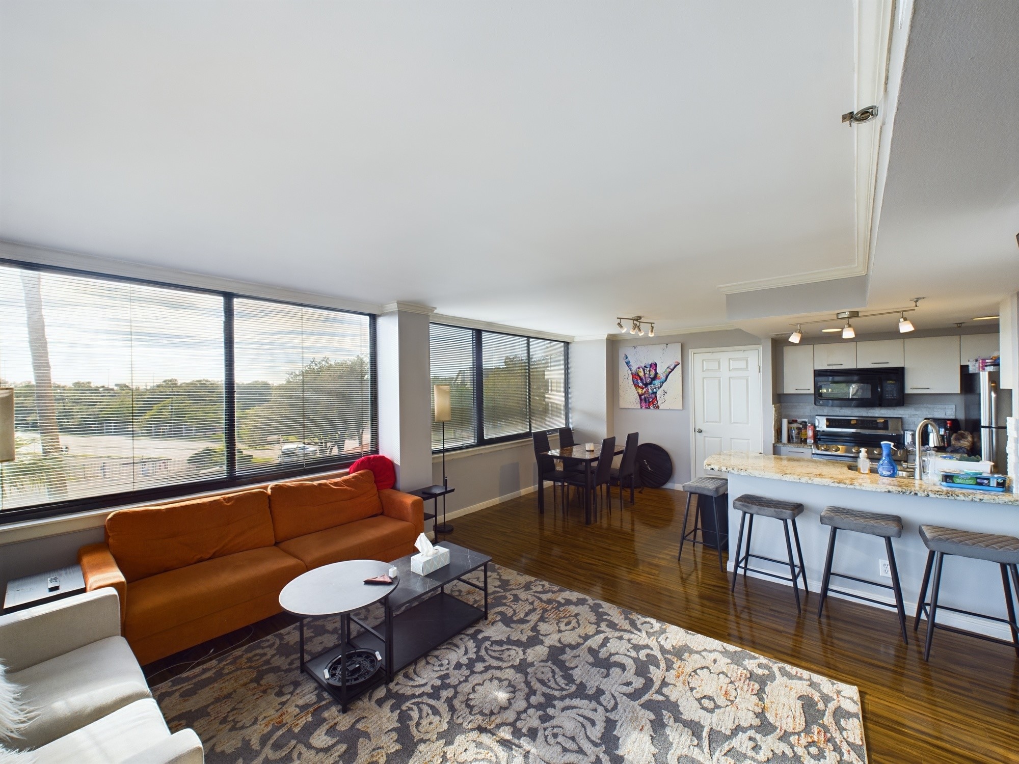 3525 Sage Road, Unit 403 Houston, TX 77056 - Photo 15 of 35 Beautiful Wood Flooring in the Bedrooms & Living Area; Tiled Kitchen & Baths