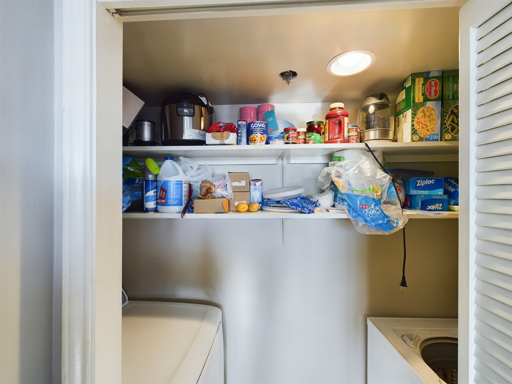 3525 Sage Road, Unit 403 Houston, TX 77056 - Photo 21 of 35 Pantry/Full-Size Laundry Room