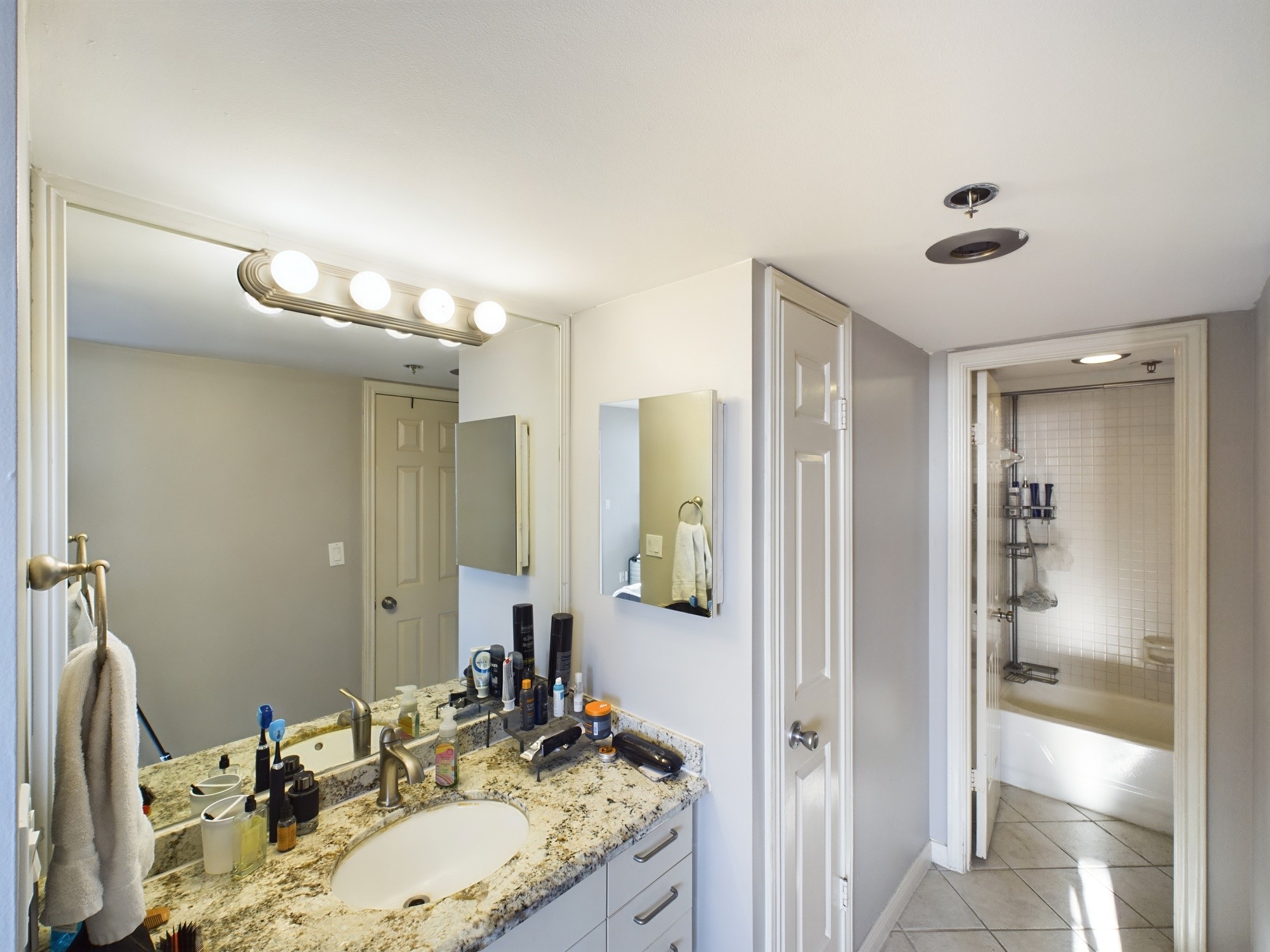 3525 Sage Road, Unit 403 Houston, TX 77056 - Photo 24 of 35 Primary Bath with Updated Counter & Fixtures