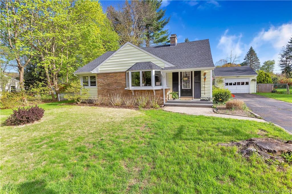 27 Hickory Road Guilford, CT 06437 - Photo 1 of 1 a house view with a garden space