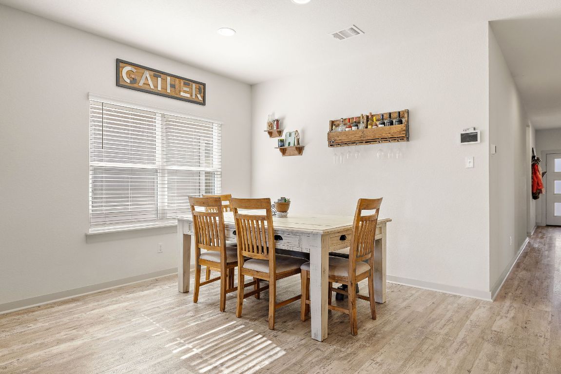 5001 Vanner Path Georgetown, TX 78626 - Photo 11 of 26 a dining room with furniture and window