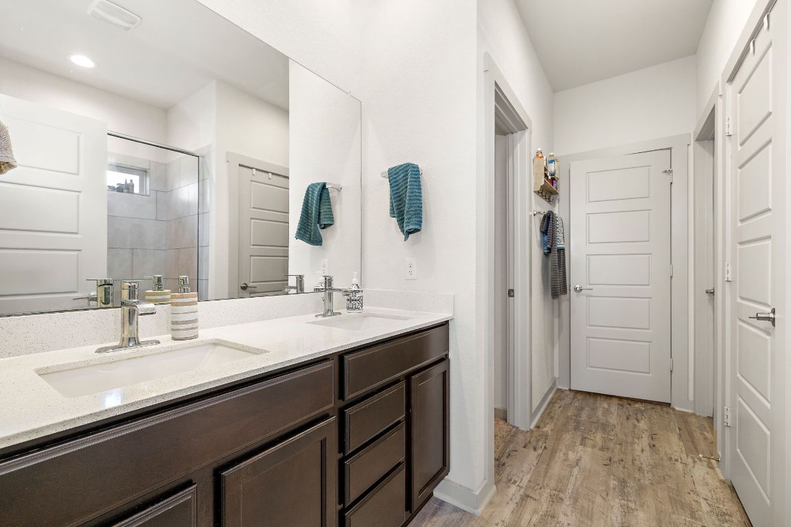5001 Vanner Path Georgetown, TX 78626 - Photo 14 of 26 a bathroom with a sink and a mirror