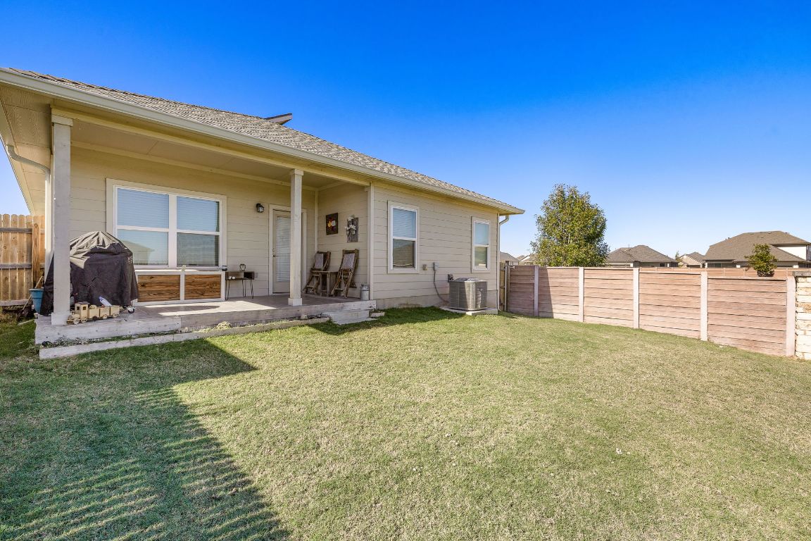 5001 Vanner Path Georgetown, TX 78626 - Photo 25 of 26 a view of a house with backyard and porch