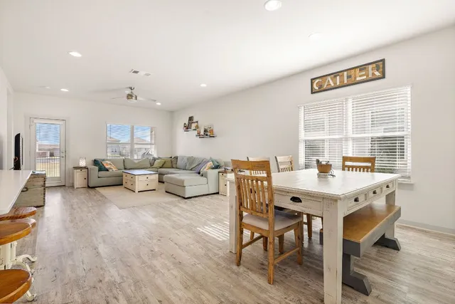 a view of a livingroom with furniture and a table
