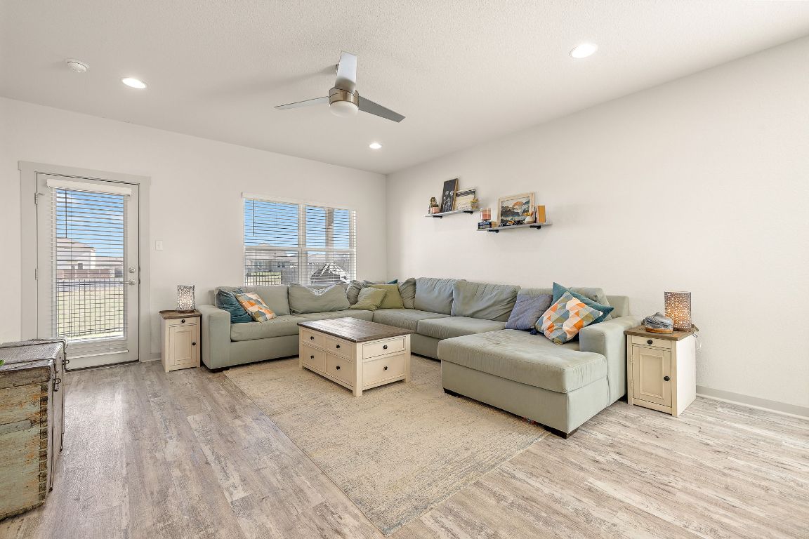 5001 Vanner Path Georgetown, TX 78626 - Photo 6 of 26 a living room with furniture and a wooden floor