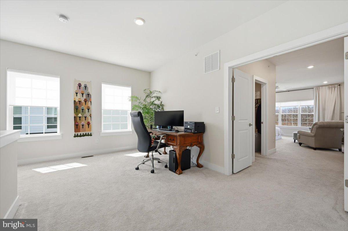 279 Red Leaf Lane Exton, PA 19341 - Photo 14 of 30 a view of a livingroom with workspace and a window