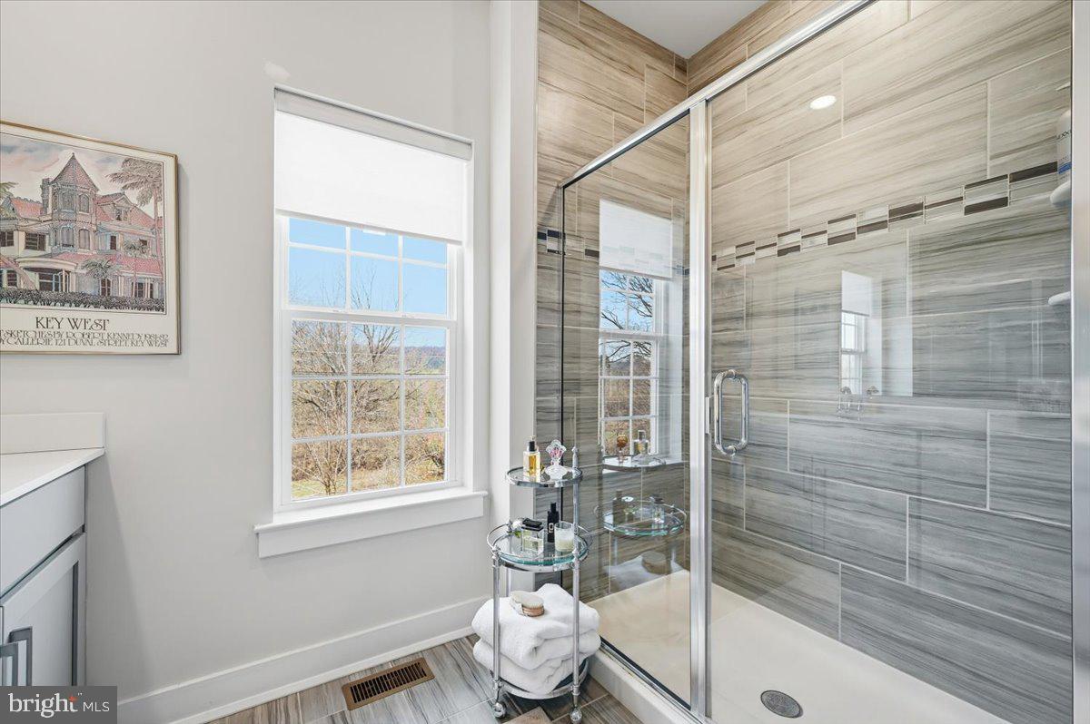 279 Red Leaf Lane Exton, PA 19341 - Photo 19 of 30 a bathroom with a tub and shower