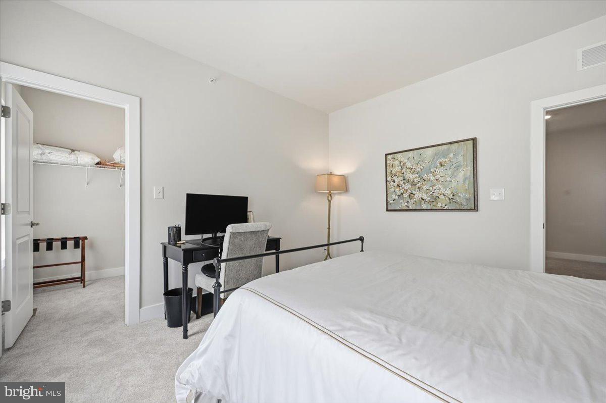 279 Red Leaf Lane Exton, PA 19341 - Photo 24 of 30 a bedroom with a bed and a television