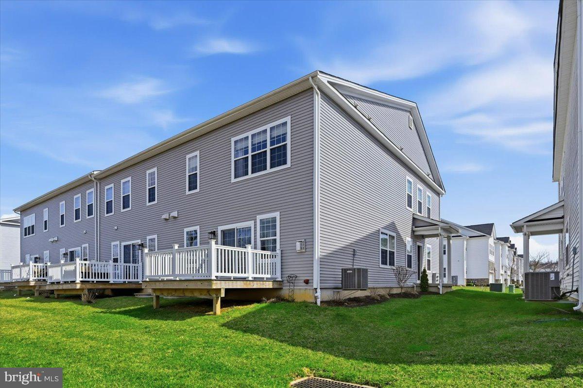279 Red Leaf Lane Exton, PA 19341 - Photo 28 of 30 a backyard of a house with table and chairs