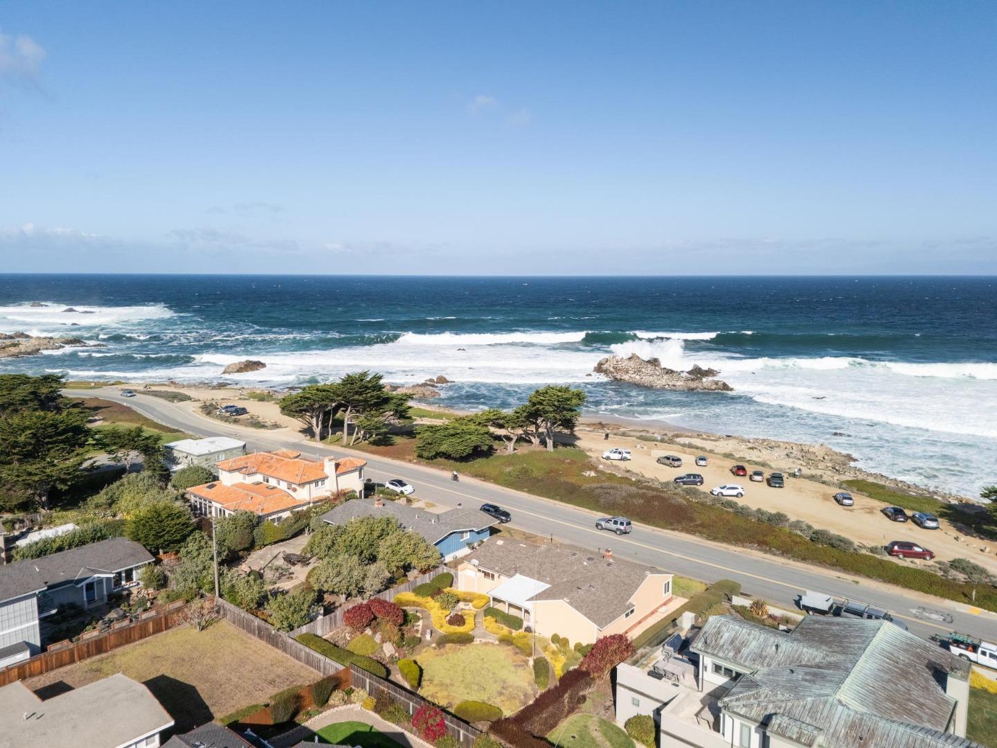 1261 Ocean View Boulevard Pacific Grove, CA 93950 - Photo 3 of 37 an aerial view of ocean and residential houses with outdoor space