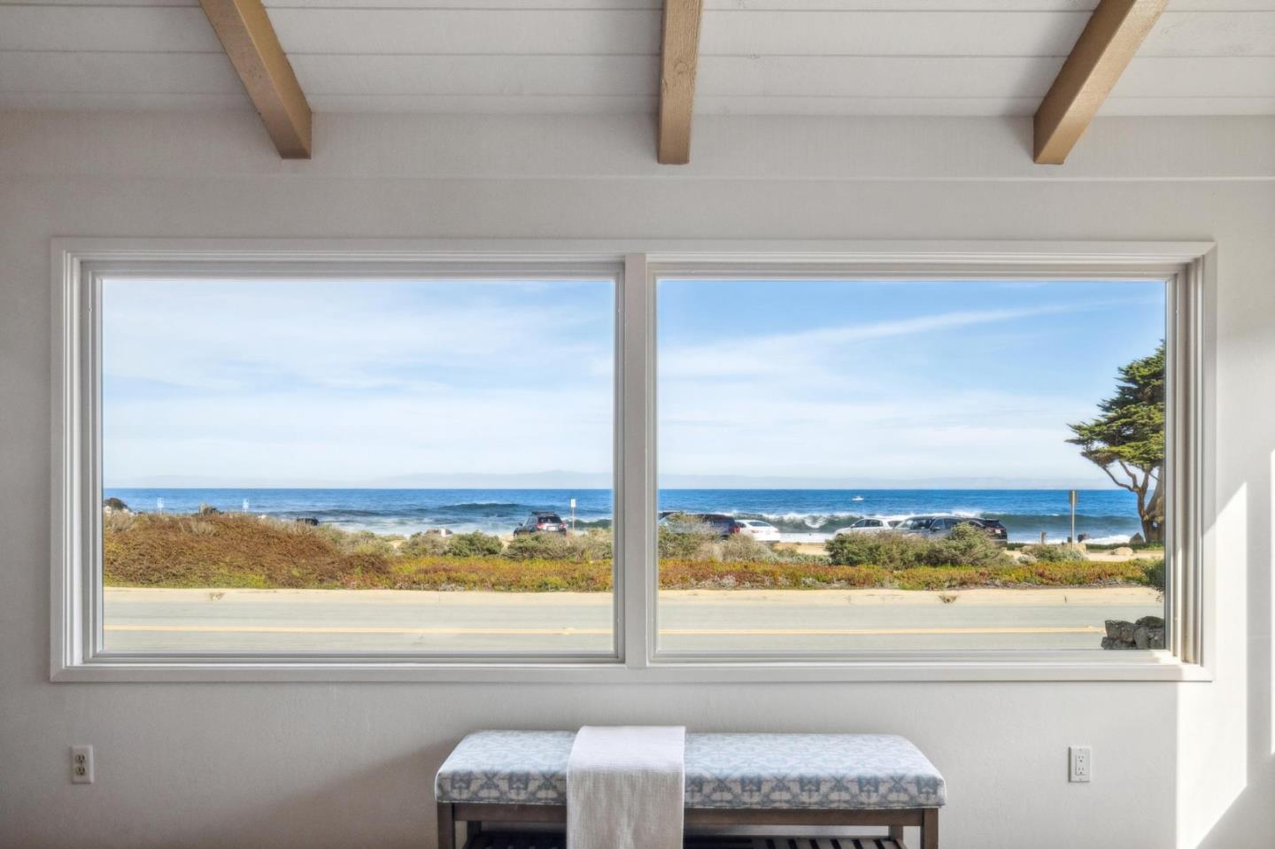 1261 Ocean View Boulevard Pacific Grove, CA 93950 - Photo 10 of 37 a view of a glass door and a window