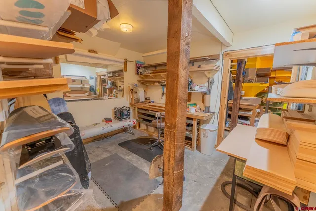 a view of a kitchen with cabinets and a stove